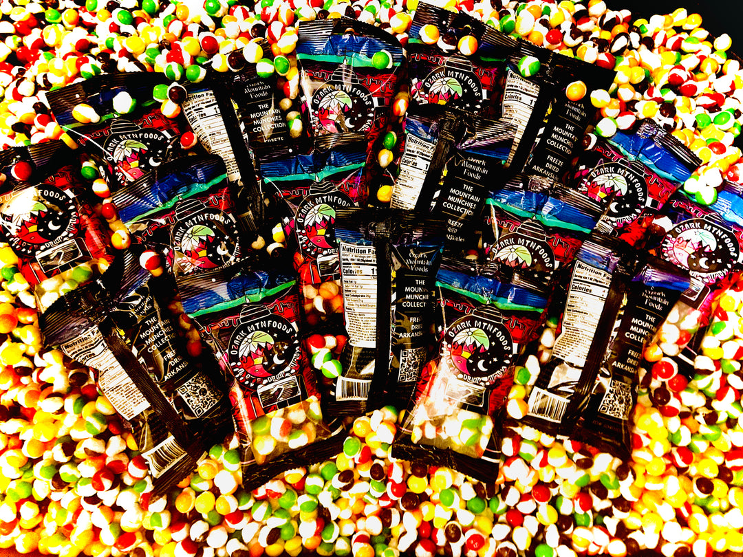 Close-up of freeze-dried Skittles inside the ARKANSkittles bag, showing their crunchy texture.